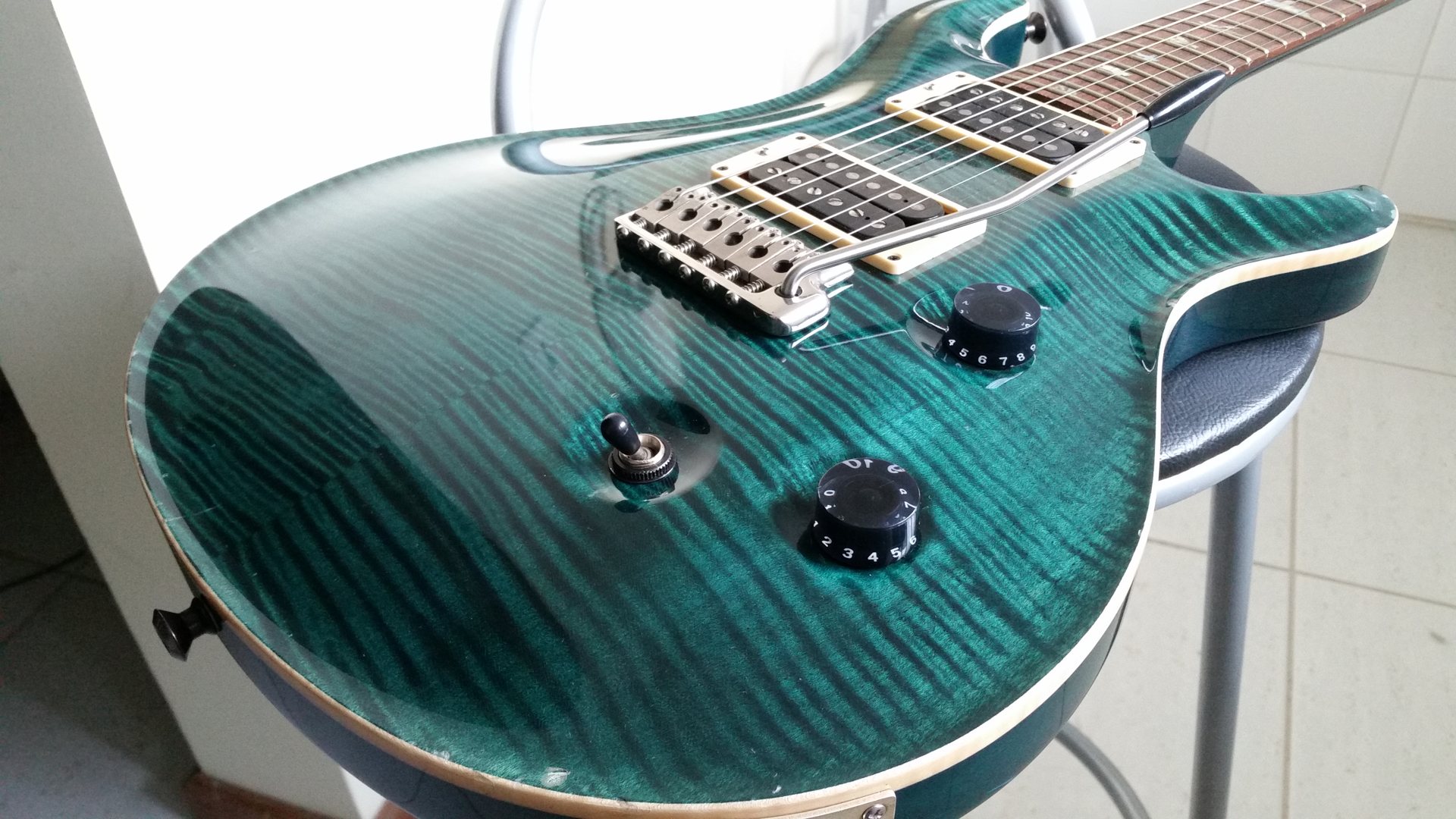 Teal black PRS Custom 24 with flamed maple top