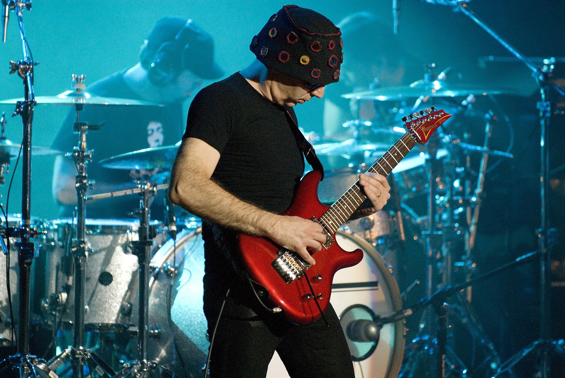 Joe Satriani live in 2008. On 2022's The Elephants of Mars, every guitar tone came from a DI signal and a SansAmp plugin.