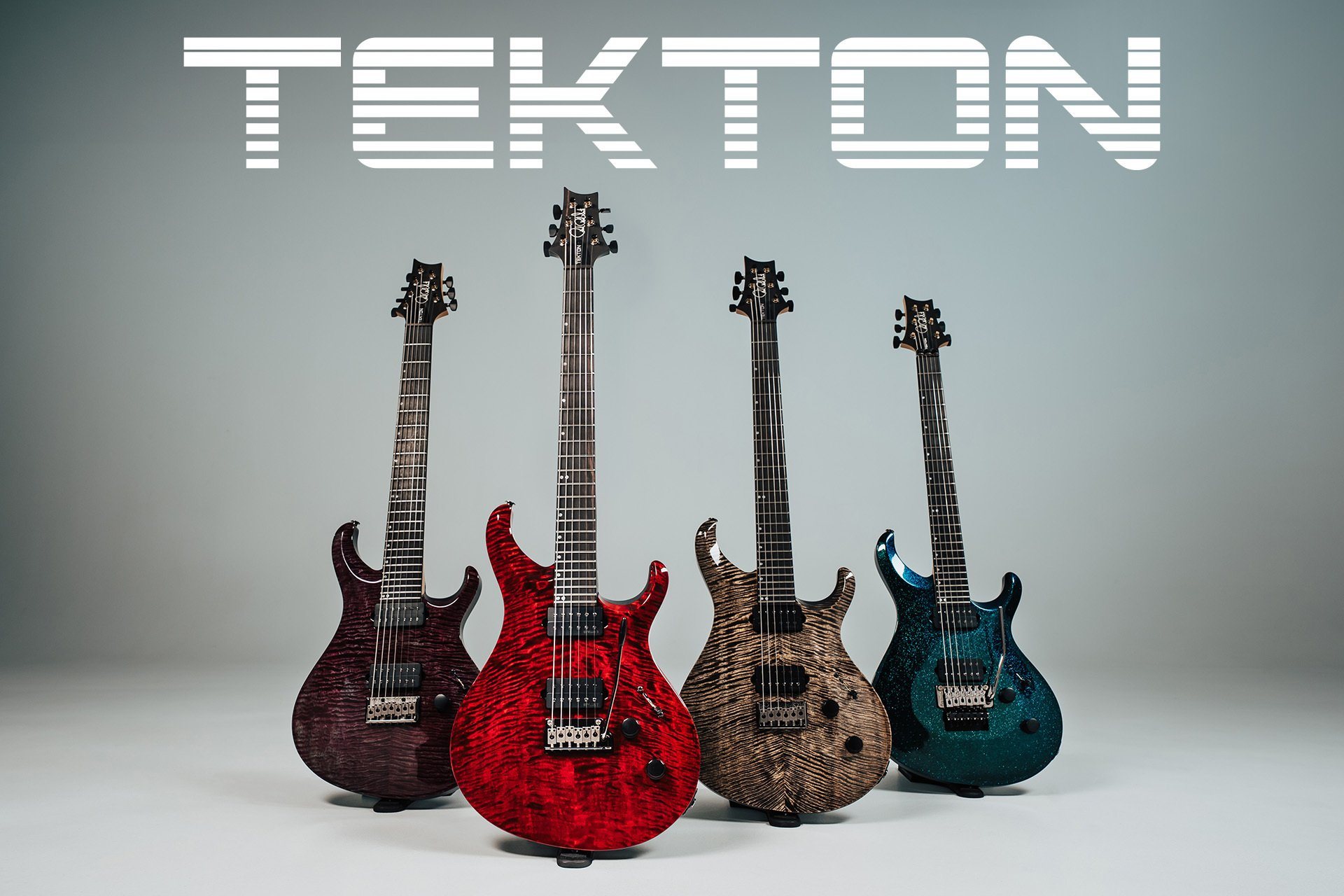 The four PRS Tekton models standing under a Tekton logo