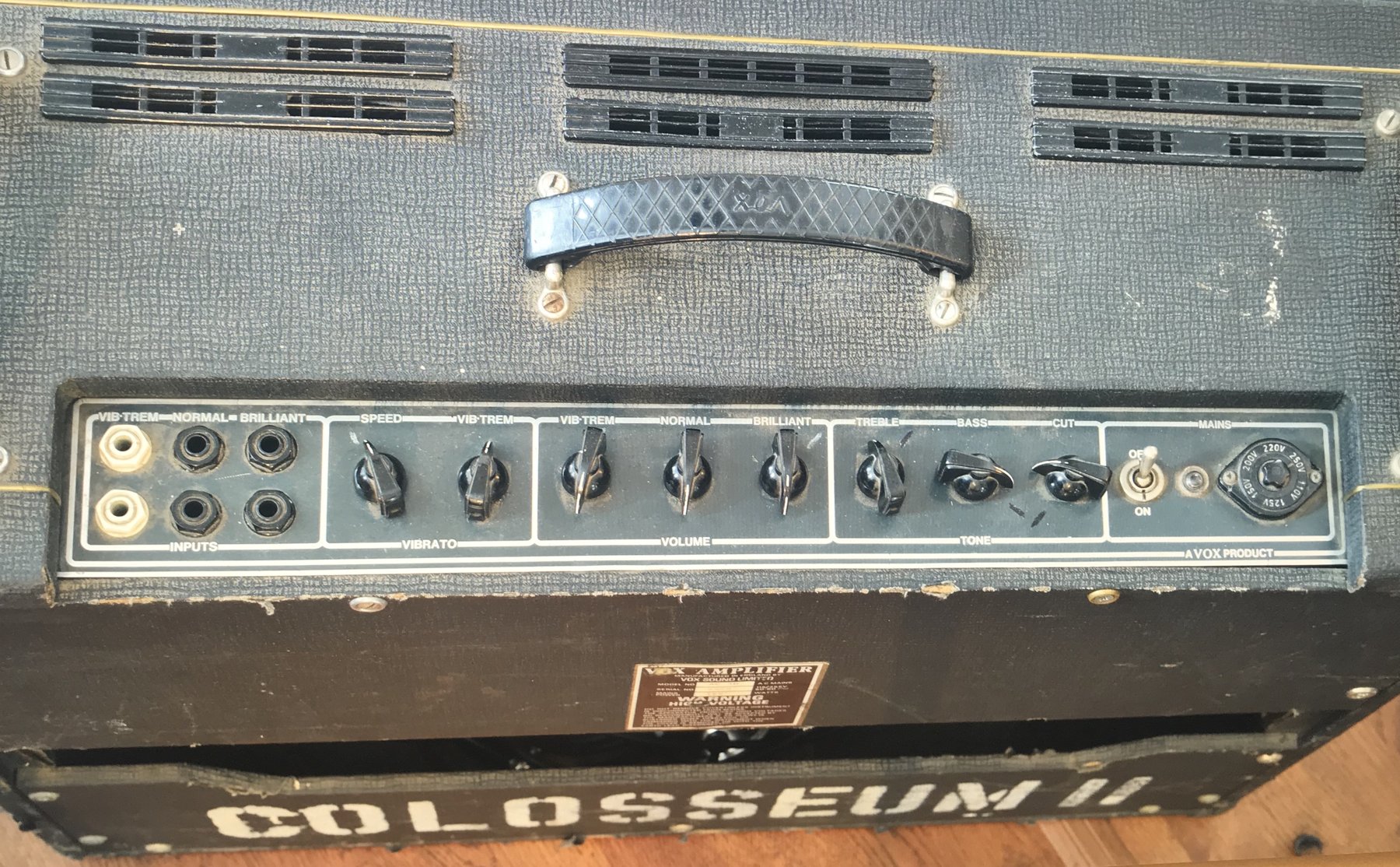 Top control panel of a vintage Vox AC30 with six input jacks and chicken-head knobs