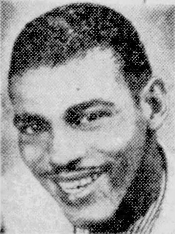 Black-and-white newspaper portrait of harmonica player Little Walter, smiling, from 1956