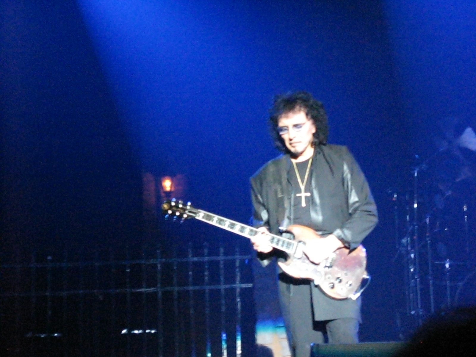 Tony Iommi playing a black Gibson SG onstage with Heaven & Hell at the NEC in Birmingham, 2007