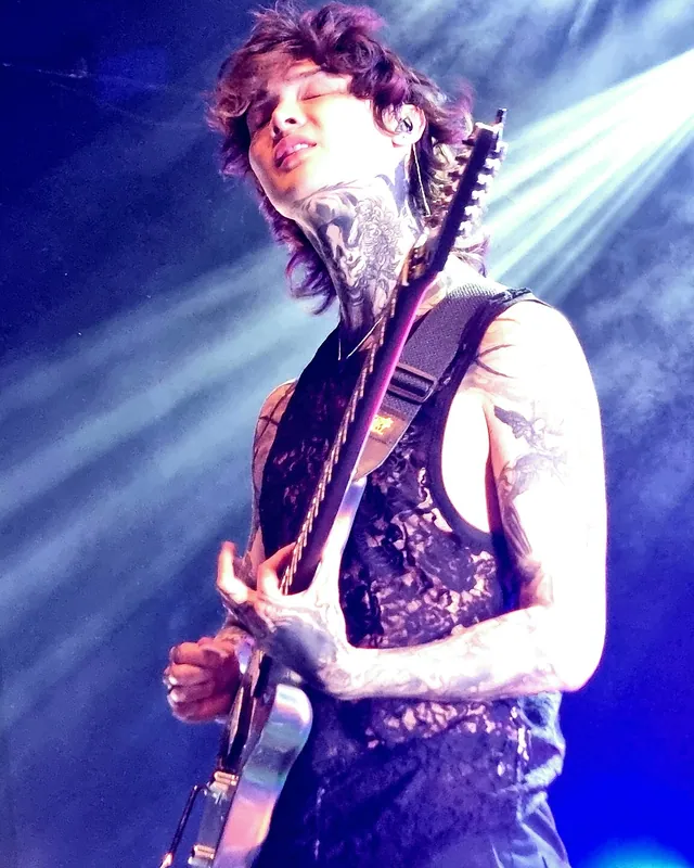 Tim Henson performing live