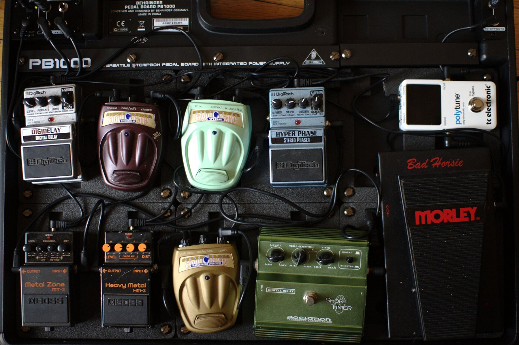 A guitar pedalboard with a DigiTech Hyper Phase phaser alongside drive and modulation pedals