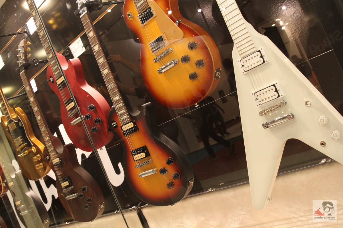Gibson Les Paul, SG and Flying V guitars on display