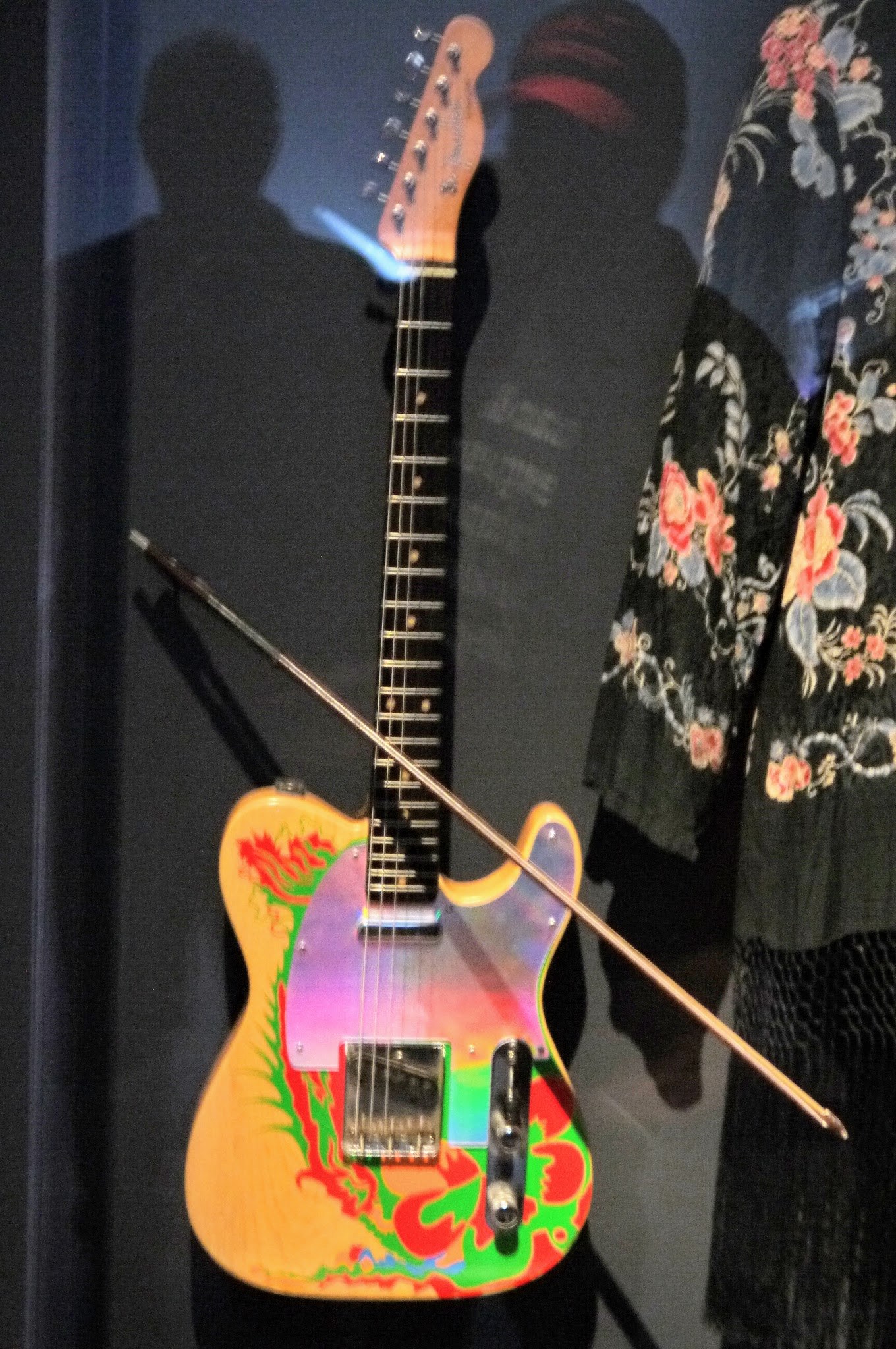 Jimmy Page's hand-painted Dragon Telecaster displayed with a violin bow at the Met