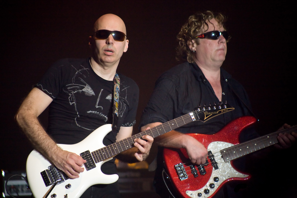 Stuart Hamm (right) with Joe Satriani in Arnhem, Netherlands, June 12, 2008. Hamm was the H in GHS.
