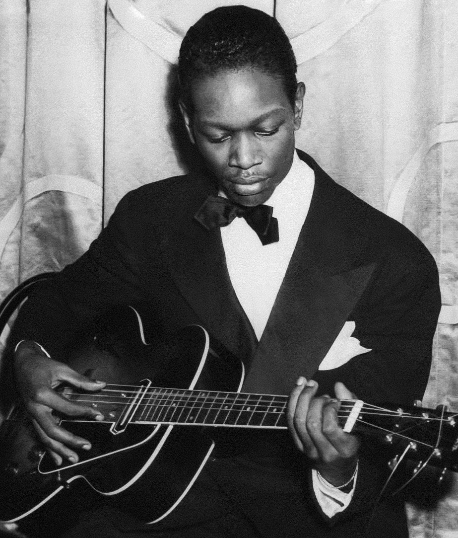 Charlie Christian holding a Gibson ES-150 in 1939