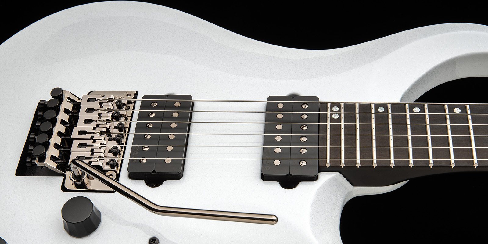 Floyd Rose 1000 Series tremolo on a white Tekton Floyd