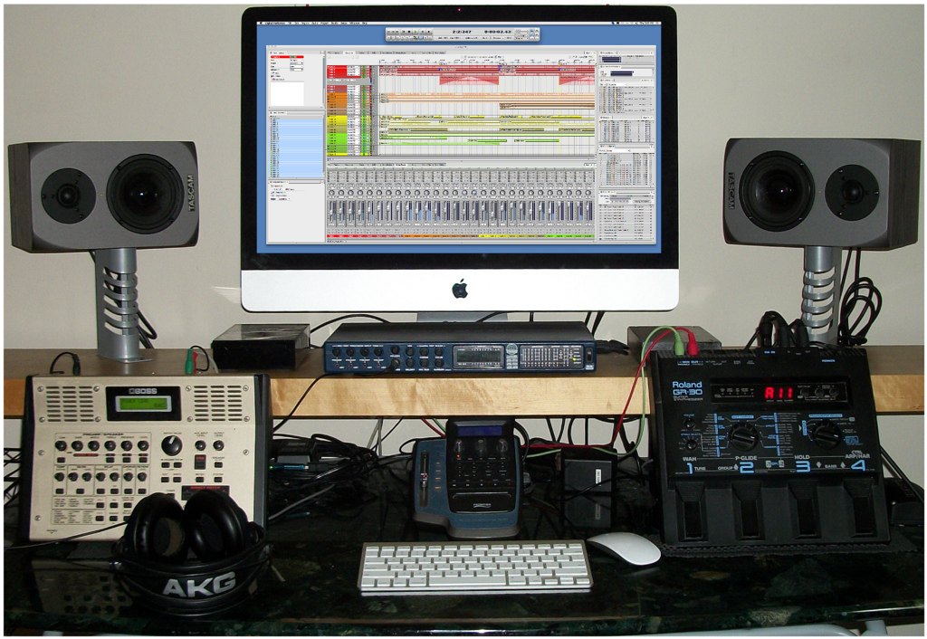 A home recording setup: a computer DAW, monitors and an interface. That's essentially the signal chain behind a major shred album now.