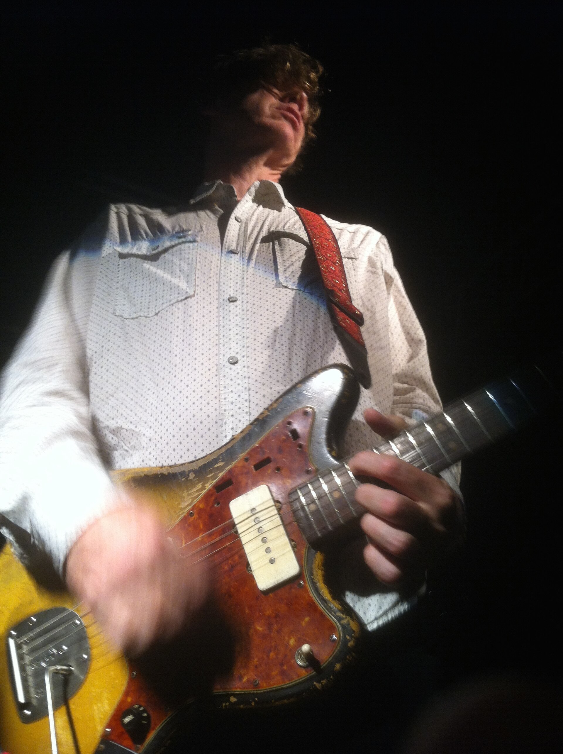Thurston Moore performing onstage in 2014