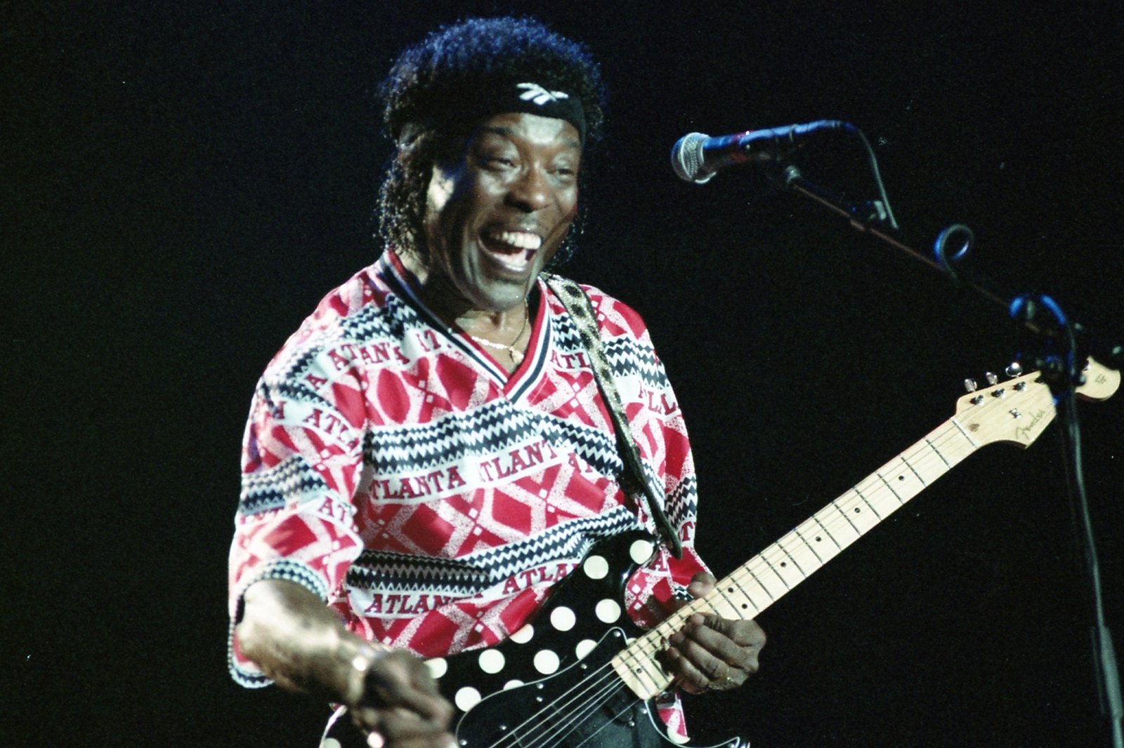 Buddy Guy in concert with one of his signature polka-dot Stratocasters.