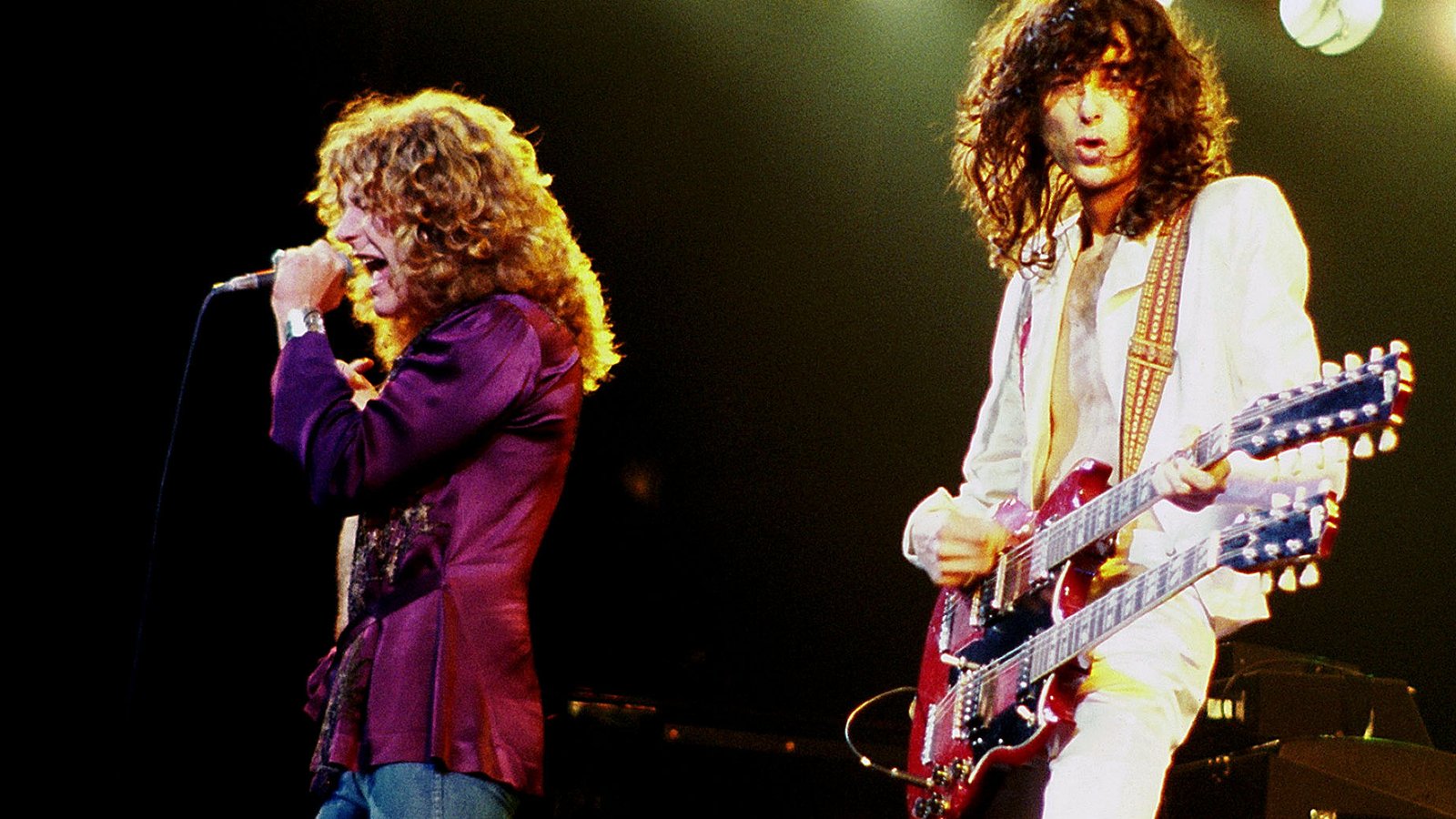 Jimmy Page and Robert Plant on stage with Led Zeppelin, 1977