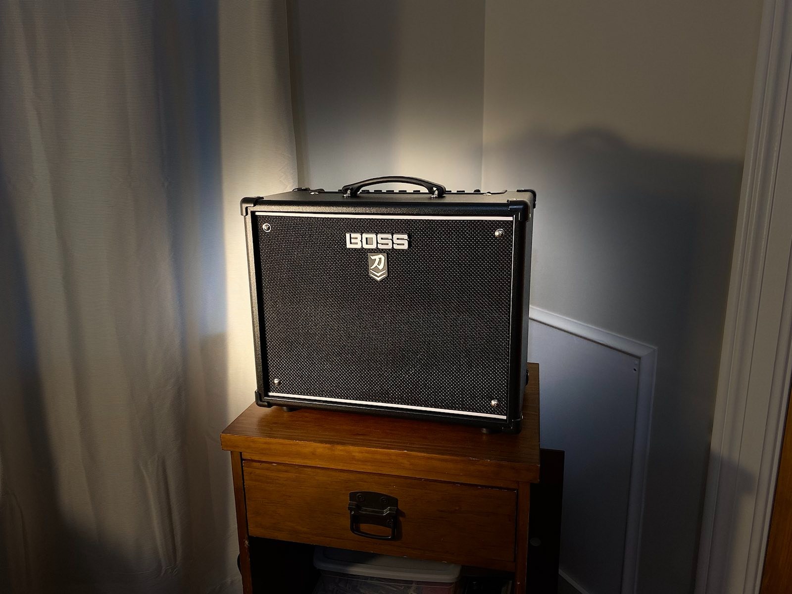 Earlier Boss Katana combo amplifier on a carpeted floor