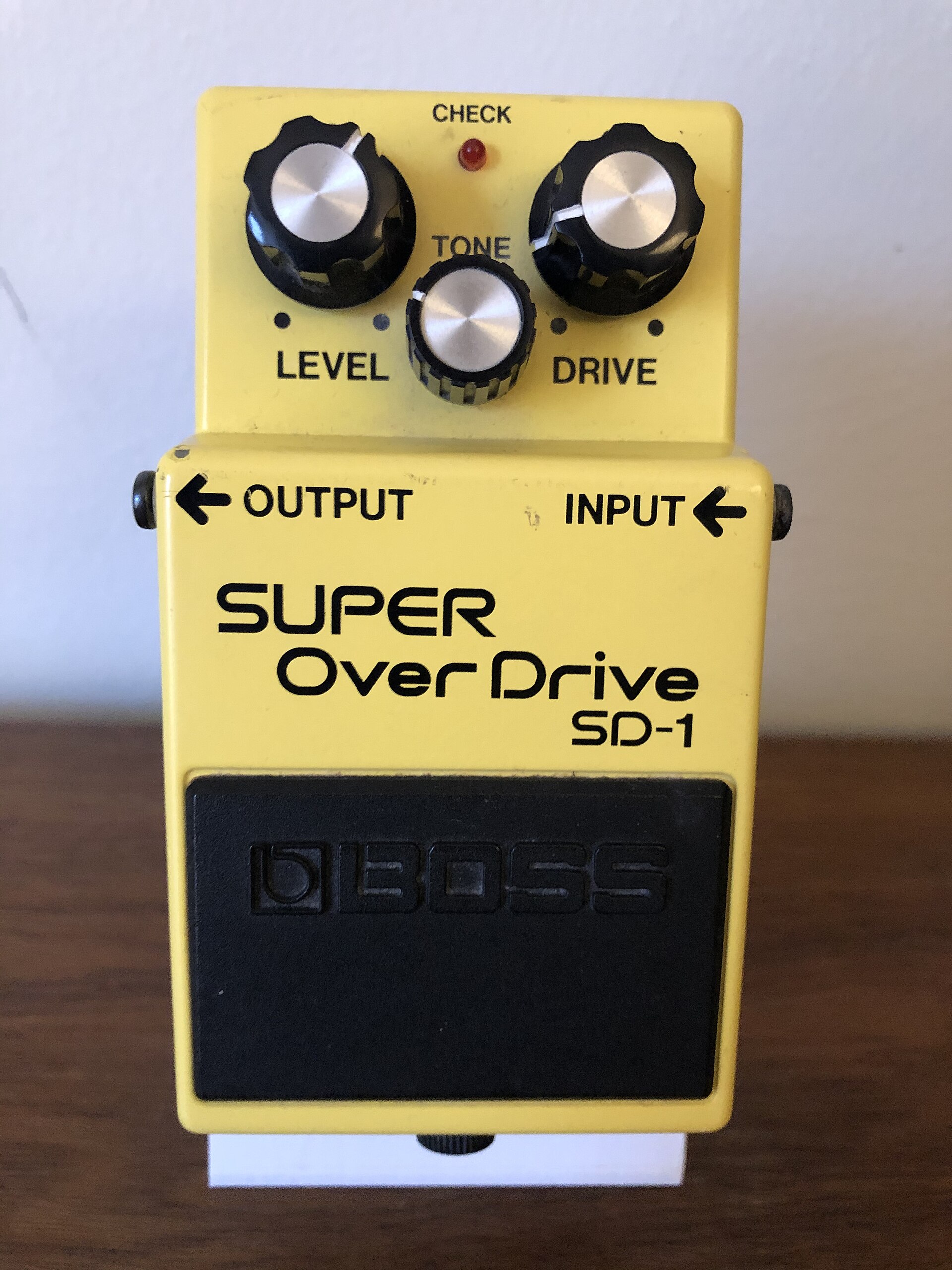 The Boss SD-1 Super OverDrive, a yellow cousin of the Tube Screamer with asymmetrical clipping.