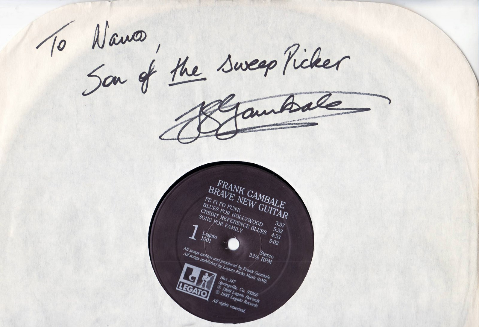An early copy of Gambale's debut LP Brave New Guitar (Legato 1001), signed to one of his students: "Son of the Sweep Picker."