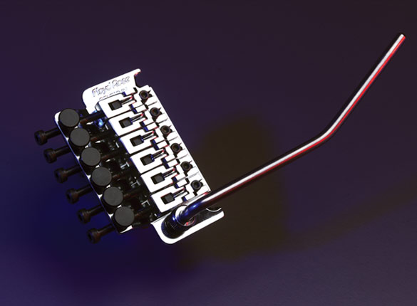 Product photo of a black Floyd Rose Original bridge with its arm