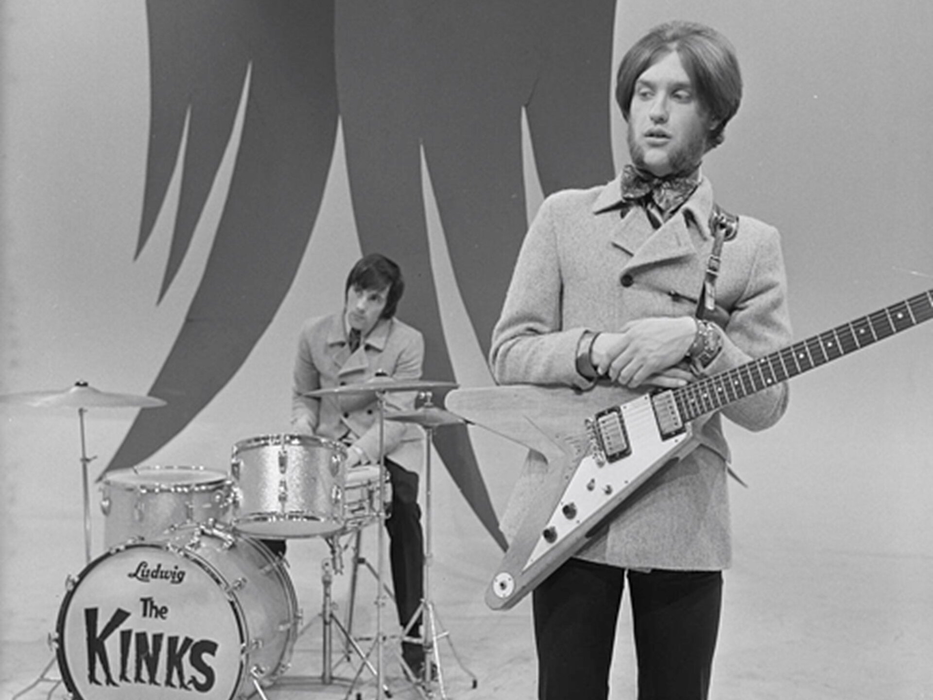 A first-run 1958-style korina Gibson Flying V, the same model as Lonnie Mack's "Number 7," played by Dave Davies of the Kinks on Dutch TV's *Fanclub* in April 1967. **Illustrative:** not Mack's guitar.