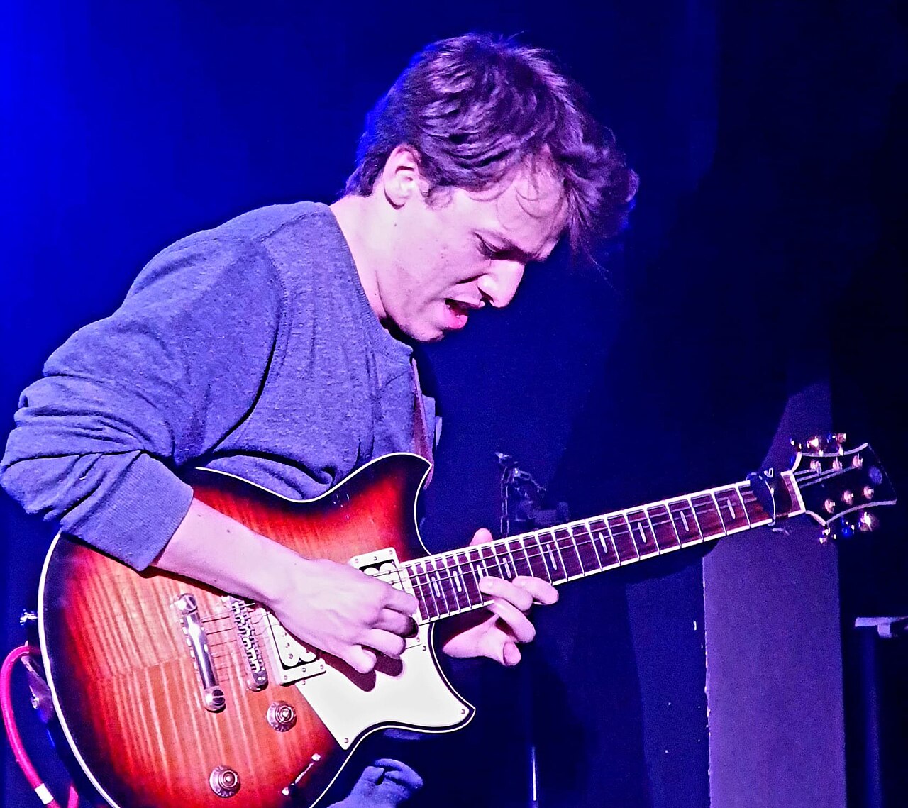 Matteo Mancuso playing a sunburst Yamaha Revstar onstage in Berlin in 2024; archival photo, not the new RS20MM