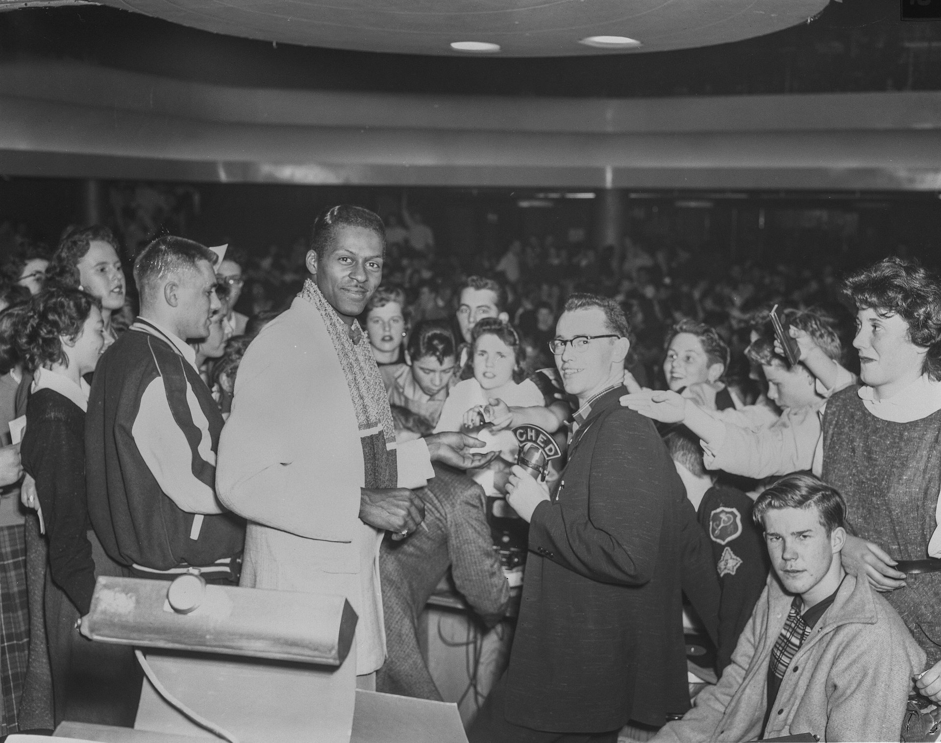 Chuck Berry with fans at the Edmonton Gardens in 1957