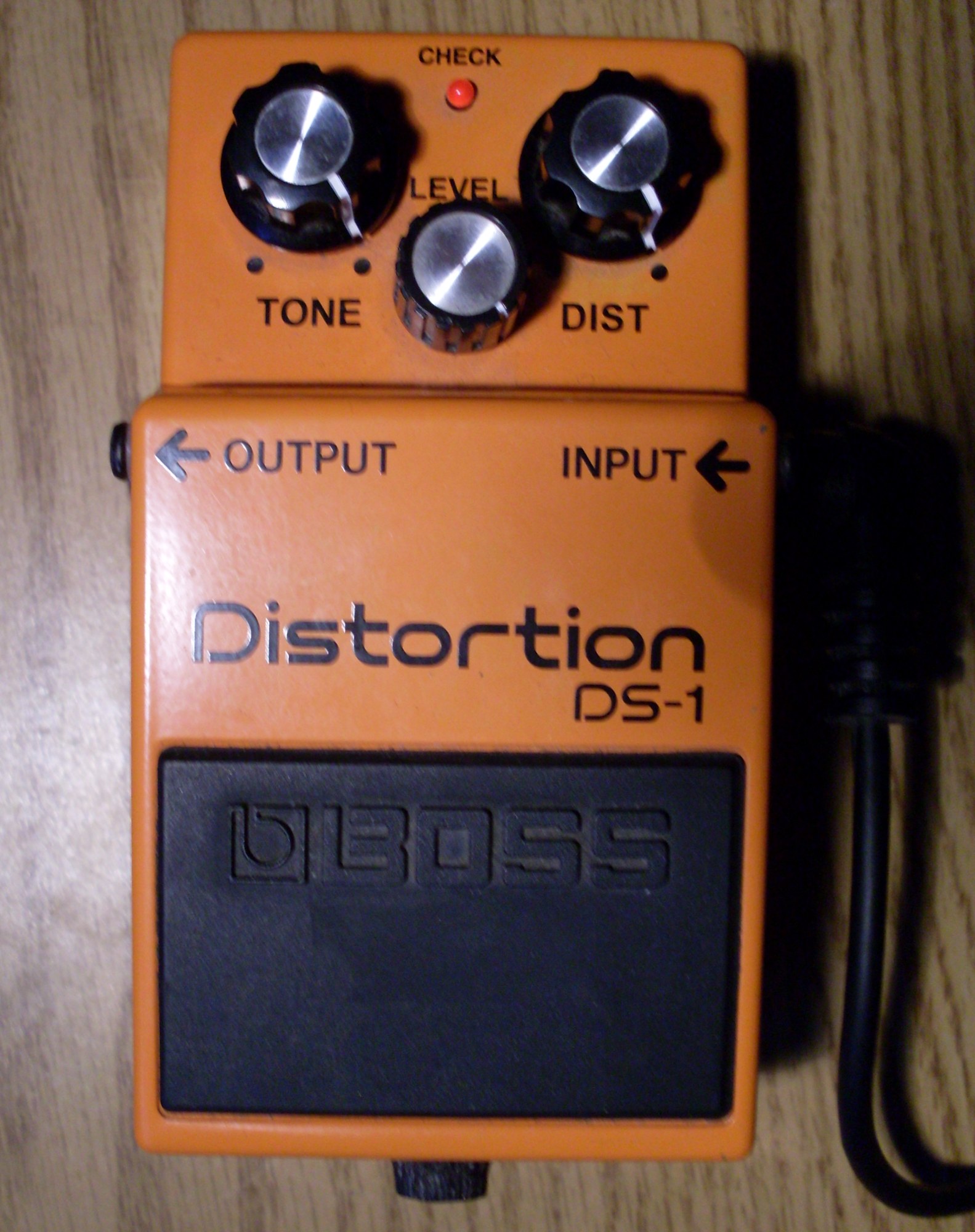 A Boss DS-1 switched on
