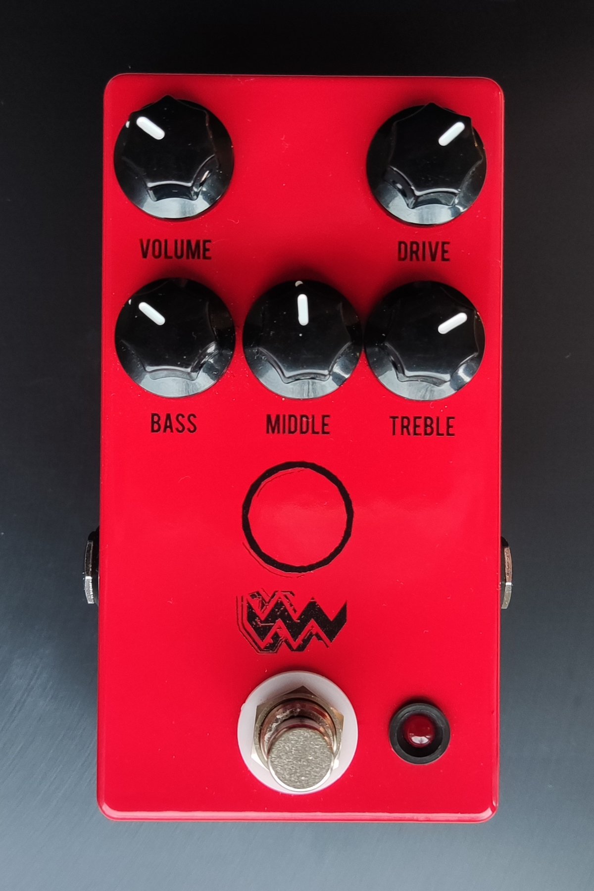 A JHS Pedals Angry Charlie V3 pedal in a red enclosure, from the same Kansas City company
