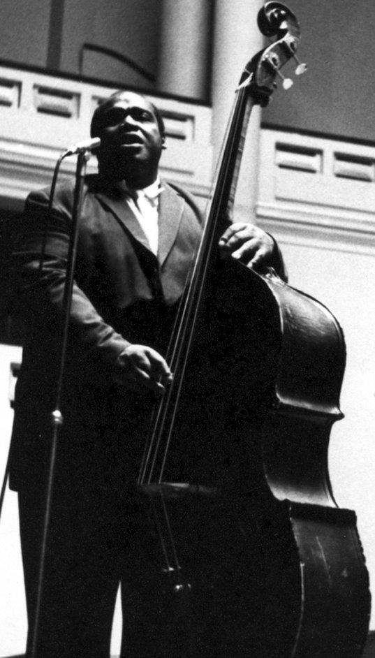 Willie Dixon playing upright bass on stage at the American Folk Blues Festival in Brussels, 1963