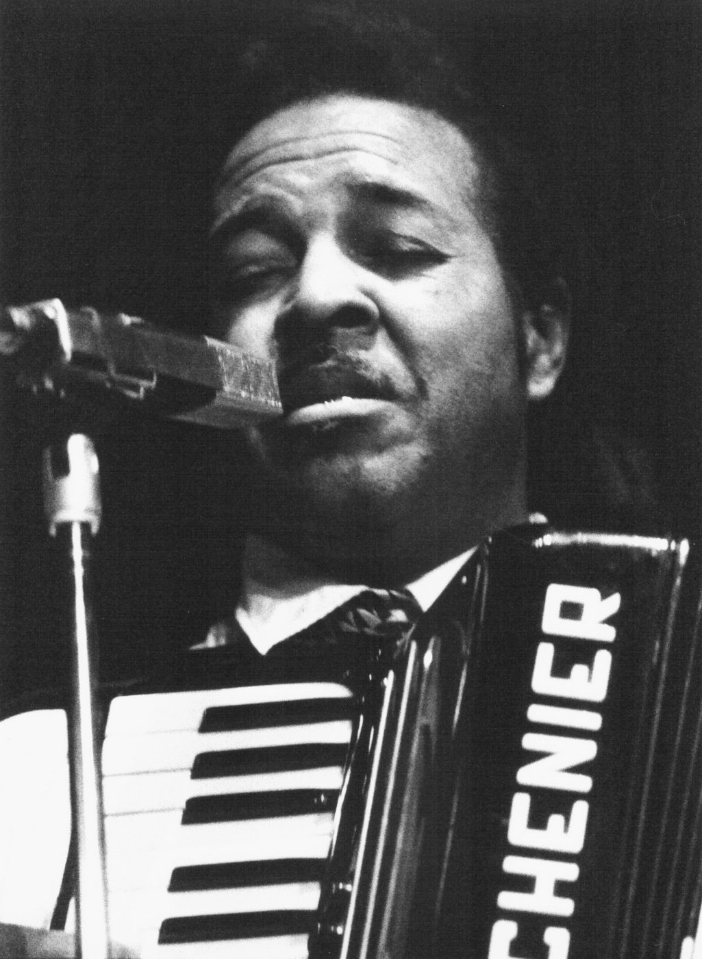 Clifton Chenier singing and playing his accordion on stage in Paris in 1977