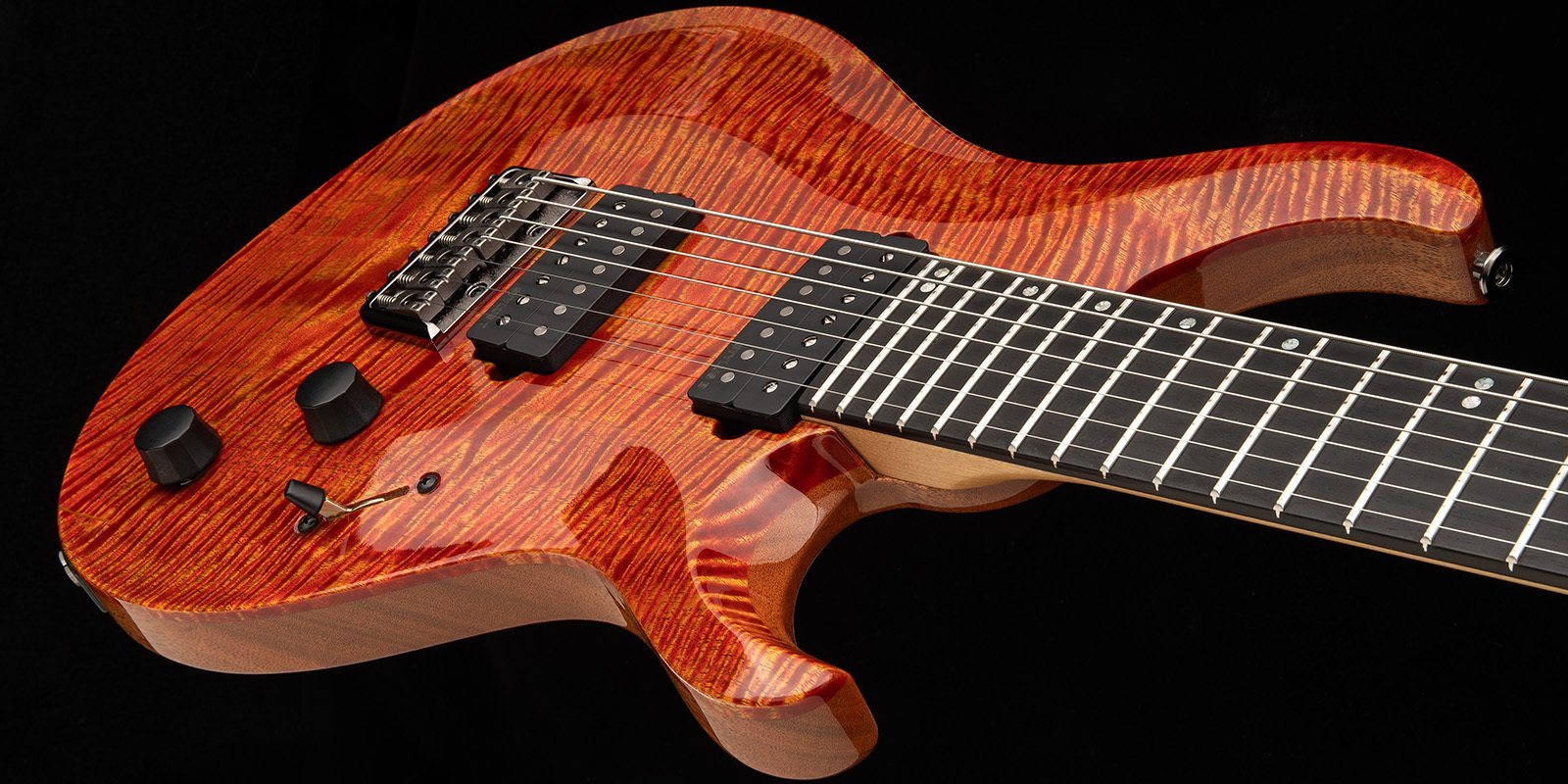 Tekton SVN ebony fretboard with offset dot inlays and stainless frets