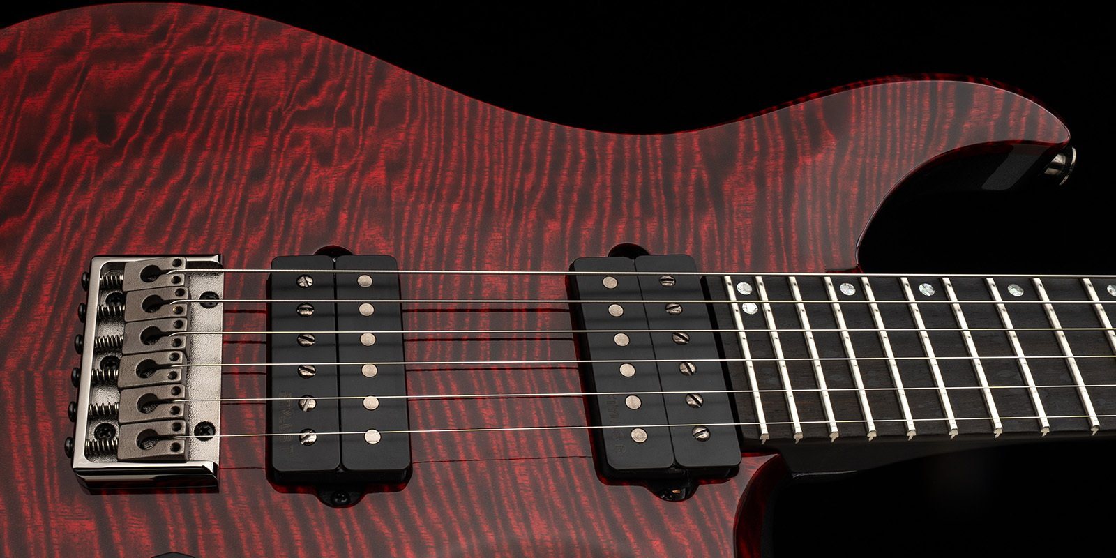 Close-up of PRS Stylus humbuckers and hardtail bridge