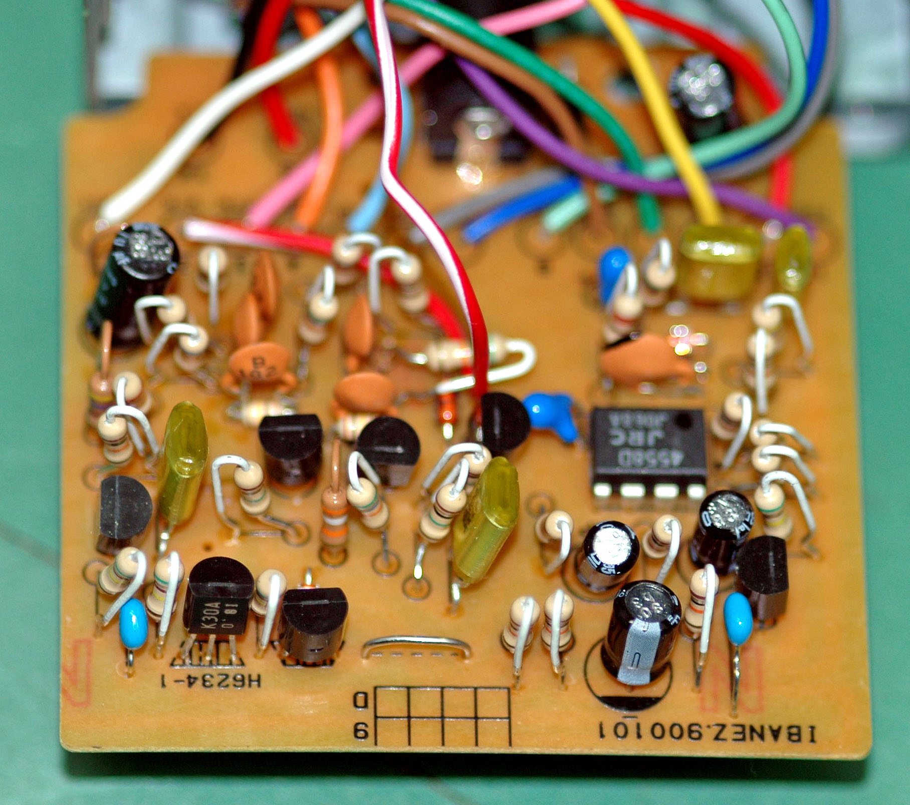 Inside a TS9 Tube Screamer: one small op-amp chip, a pair of clipping diodes, and a handful of resistors and capacitors.