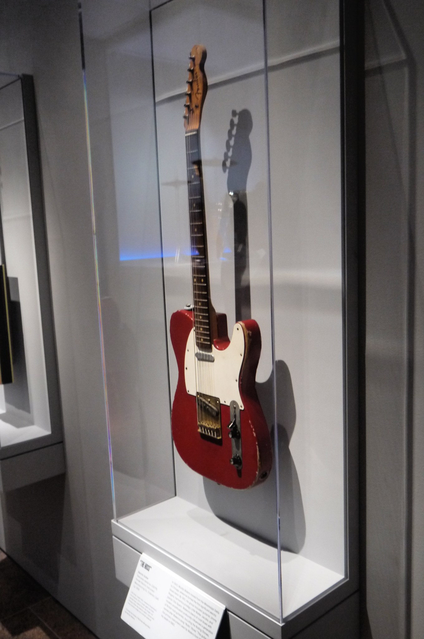 Muddy Waters' red Telecaster, The Hoss, in a glass display case at the Met